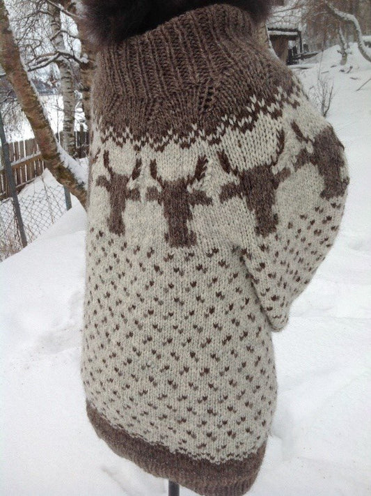 Bildet av genser med kuer som vi selger oppskrift og garn til.